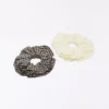 2er-Pack Scrunchies mit Schweizer Stickerei 2er-Pack Scrunchies mit Schweizer Stickerei