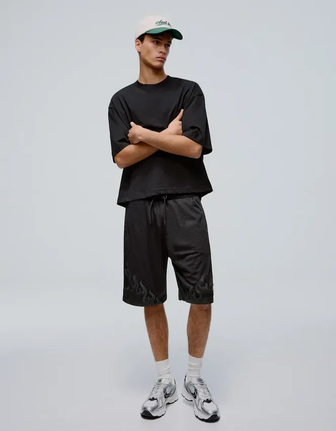 Bedruckte Bermudashorts aus Mesh Bedruckte Bermudashorts aus Mesh