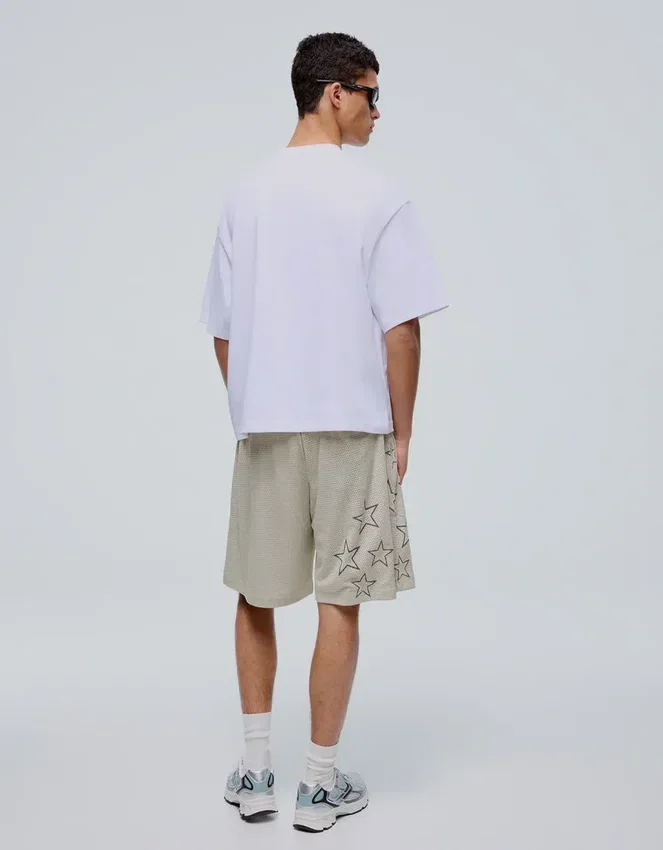 Bedruckte Bermudashorts aus Mesh Bedruckte Bermudashorts aus Mesh