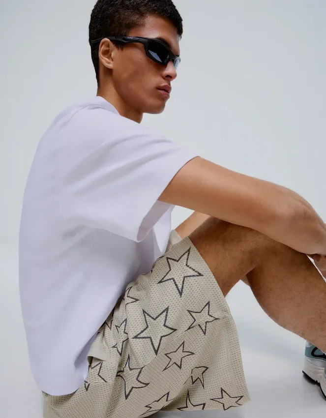 Bedruckte Bermudashorts aus Mesh Bedruckte Bermudashorts aus Mesh