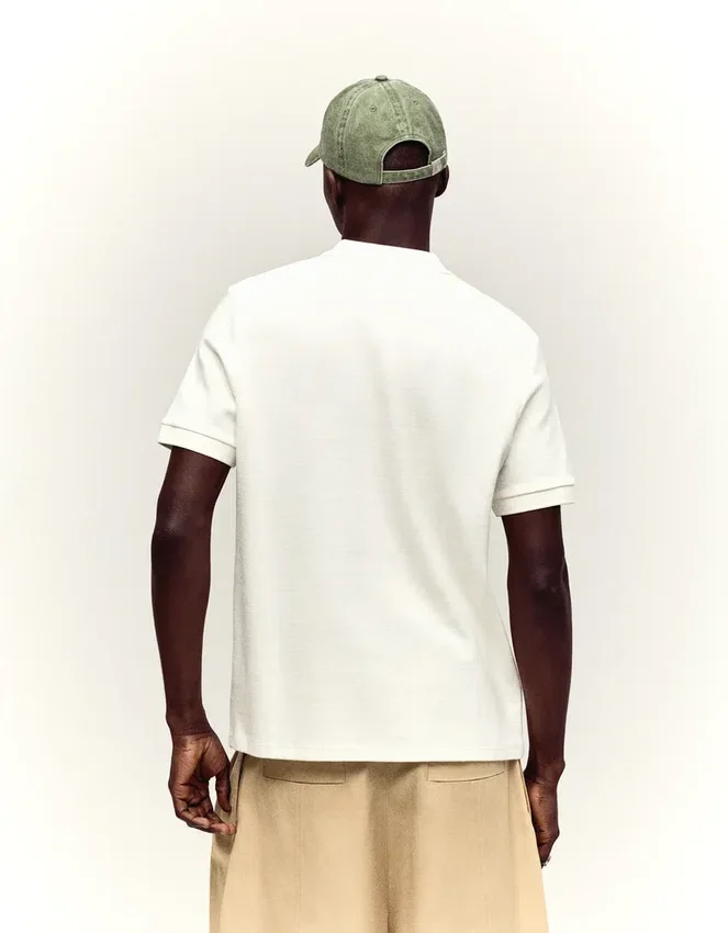 Besticktes Kurzarm-Poloshirt – T-Shirts und Poloshirts Besticktes Kurzarm-Poloshirt – T-Shirts und Poloshirts