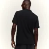 Besticktes Kurzarm-Poloshirt – T-Shirts und Poloshirts Besticktes Kurzarm-Poloshirt – T-Shirts und Poloshirts