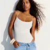 Bodysuit mit Trägern und Drapierung Bodysuit mit Trägern und Drapierung
