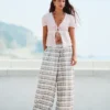Gekarierte Hose mit tiefem Schritt Gekarierte Hose mit tiefem Schritt