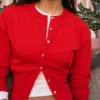 Gestreifte Jacke mit Rundhalsausschnitt und Knöpfen – Pullover und Strickjacken