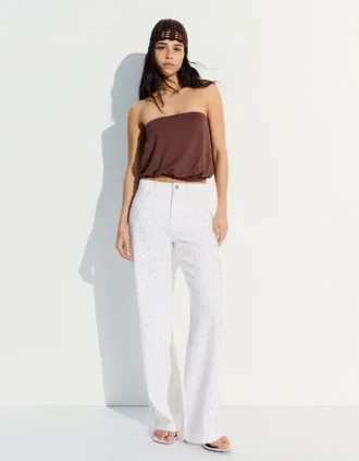 Hoch taillierte, schimmernde Straight-Leg-Jeans