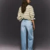Hoch taillierte, Straight geschnittene Jeans mit Wide Leg und umgeschlagenem Saum – Hose Hoch taillierte, Straight geschnittene Jeans mit Wide Leg und umgeschlagenem Saum – Hose