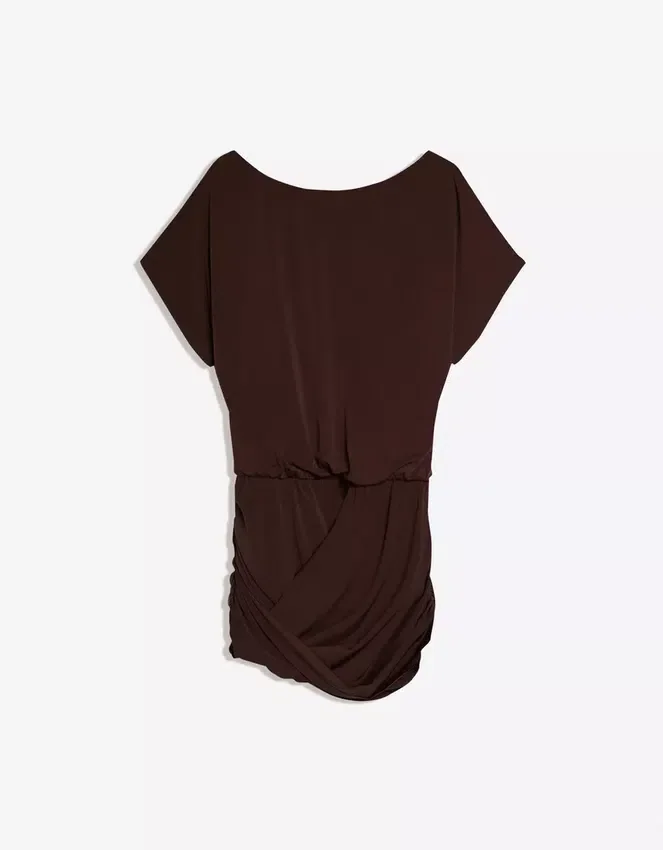 Kleid mit offenem Rücken und drapiertem Rock Kleid mit offenem Rücken und drapiertem Rock