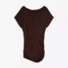 Kleid mit offenem Rücken und drapiertem Rock Kleid mit offenem Rücken und drapiertem Rock