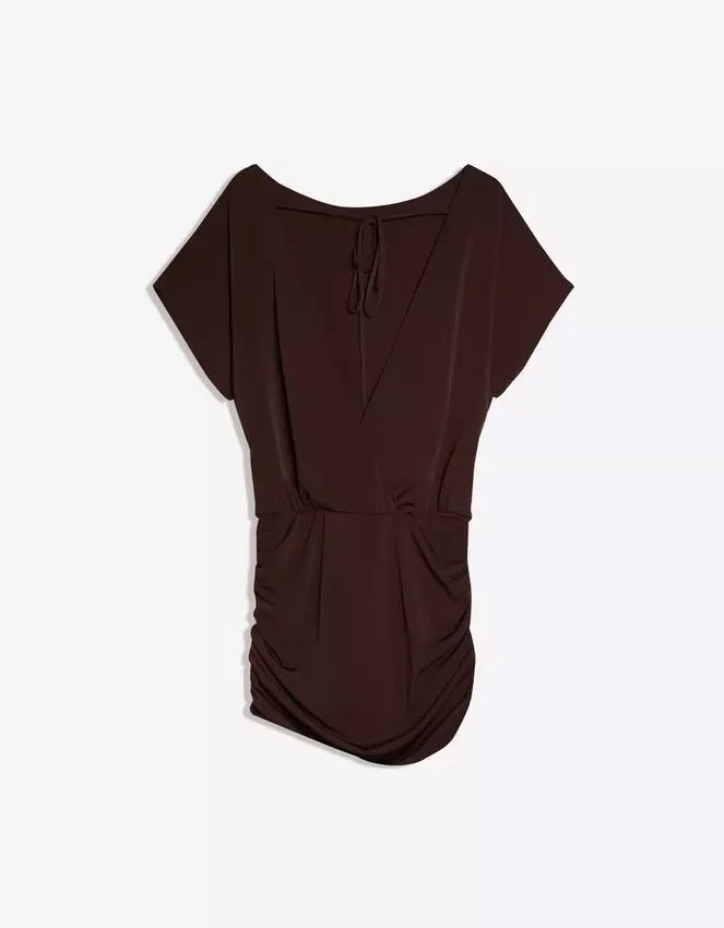 Kleid mit offenem Rücken und drapiertem Rock Kleid mit offenem Rücken und drapiertem Rock