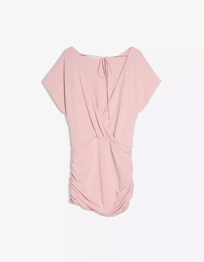 Kleid mit offenem Rücken und drapiertem Rock Kleid mit offenem Rücken und drapiertem Rock