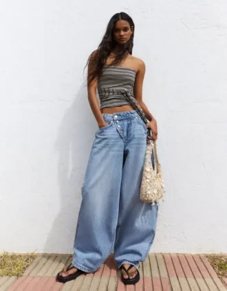 Low-Rise-Jeans mit Wide Leg und Knopfleiste vorne – Hose