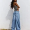 Low-Rise-Jeans mit Wide Leg und Knopfleiste vorne – Hose Low-Rise-Jeans mit Wide Leg und Knopfleiste vorne – Hose