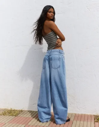 Low-Rise-Jeans mit Wide Leg und Knopfleiste vorne – Hose