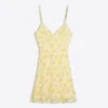 Mini-Kleid mit Blumenmuster aus Spitze Mini-Kleid mit Blumenmuster aus Spitze