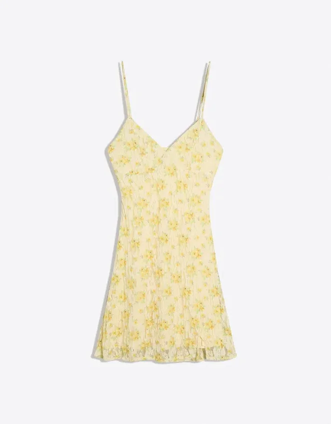 Mini-Kleid mit Blumenmuster aus Spitze Mini-Kleid mit Blumenmuster aus Spitze