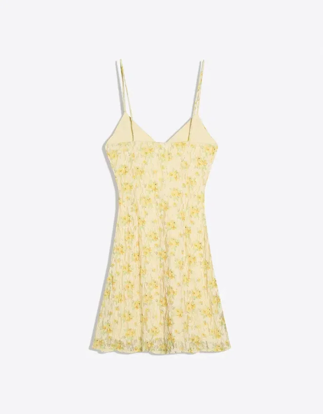 Mini-Kleid mit Blumenmuster aus Spitze Mini-Kleid mit Blumenmuster aus Spitze