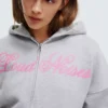 Oversize-Hoodie mit Reißverschluss und Aufdruck Oversize-Hoodie mit Reißverschluss und Aufdruck