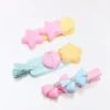 Packung mit Polly Pocket-Fellclips Packung mit Polly Pocket-Fellclips