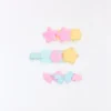 Packung mit Polly Pocket-Fellclips Packung mit Polly Pocket-Fellclips