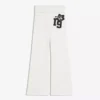 Plüsch-Hose mit ausgestelltem Bein und Aufnäher Plüsch-Hose mit ausgestelltem Bein und Aufnäher