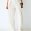Rustikale Hose mit Wide Leg und Falten Rustikale Hose mit Wide Leg und Falten