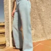 Schimmernde Jeans mit hoher Taille und Straight-Bein-Silhouette Schimmernde Jeans mit hoher Taille und Straight-Bein-Silhouette