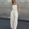 Wide Leg Jeans mit niedriger Leibhöhe und Abnähern